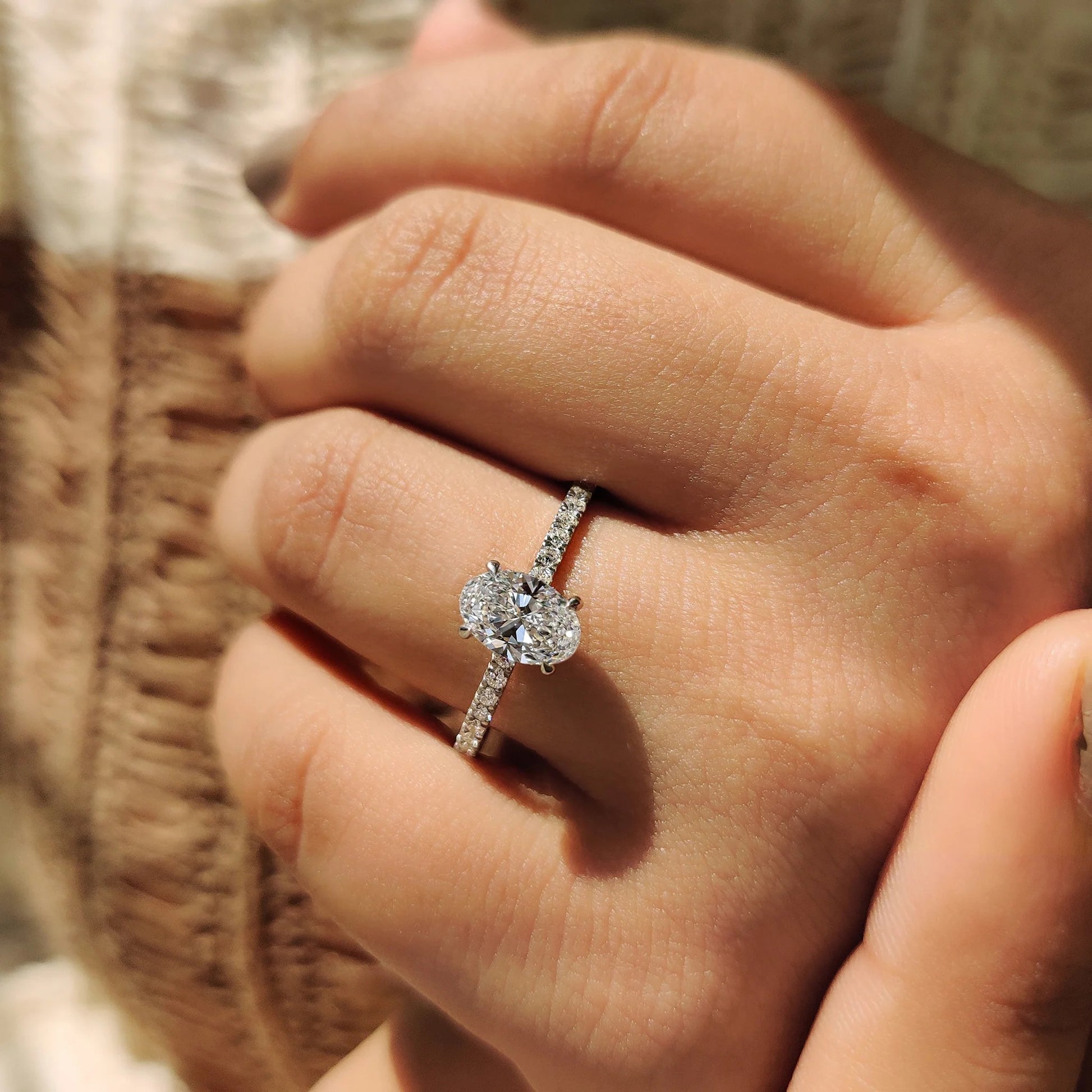 Oval Diamond Engagement Ring With Hidden Halo Setting