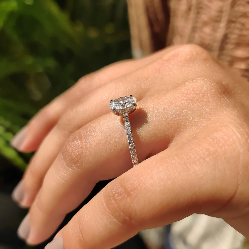 Oval Diamond Engagement Ring With Hidden Halo Setting
