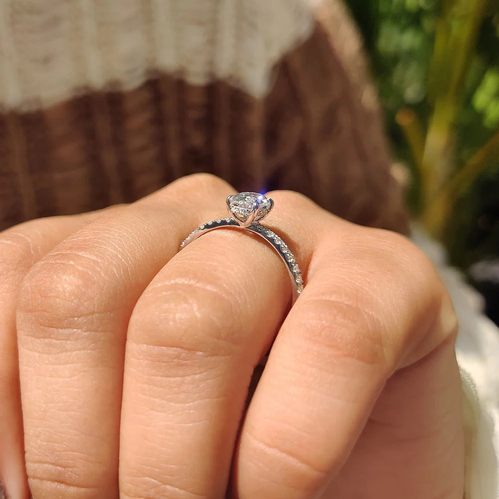 Oval Diamond Engagement Ring With Hidden Halo Setting
