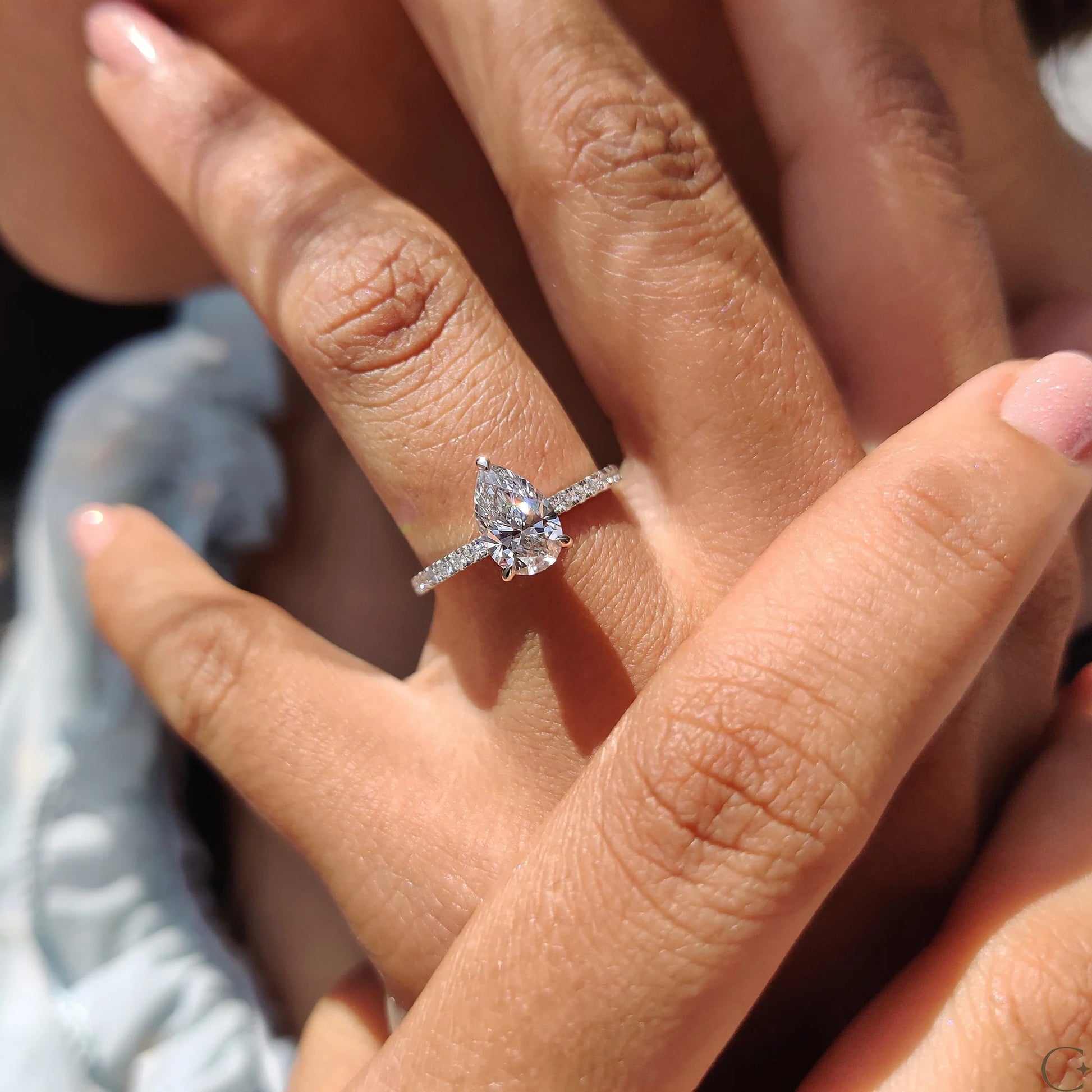 Pear Cut Engagement Ring with Hidden Halo Design