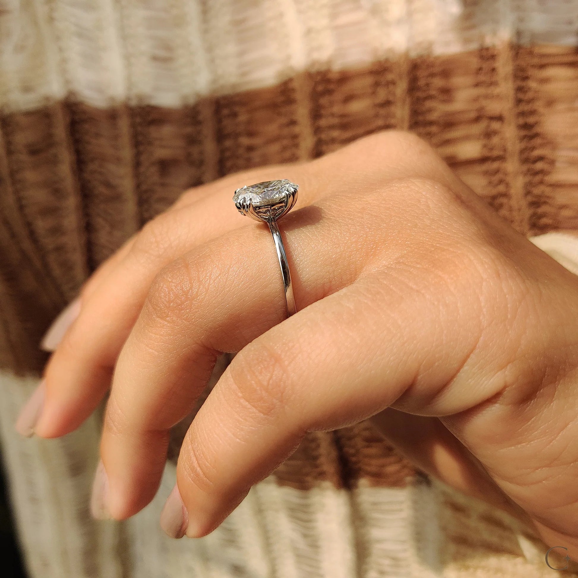 Oval Shaped Diamond Engagement Ring In Solitaire Style