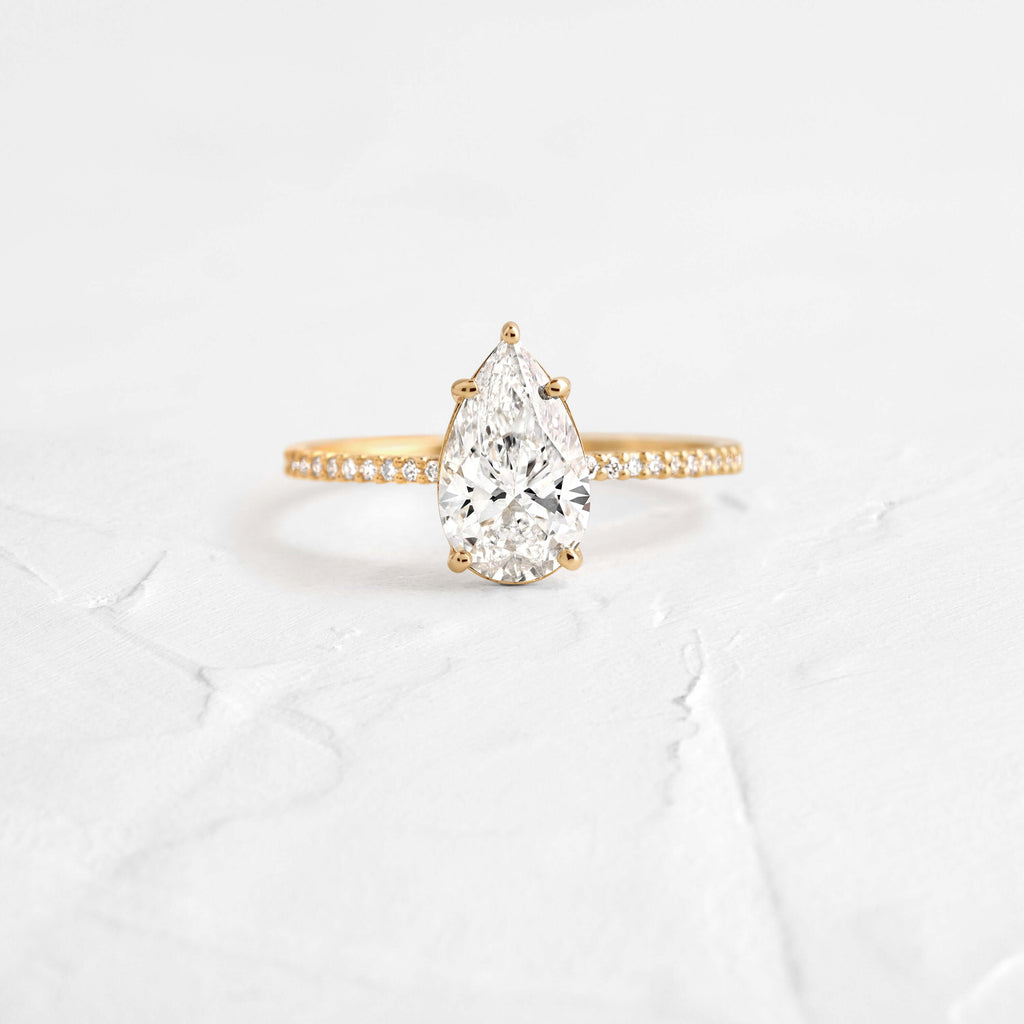 Pear Cut Engagement Ring with Hidden Halo Design